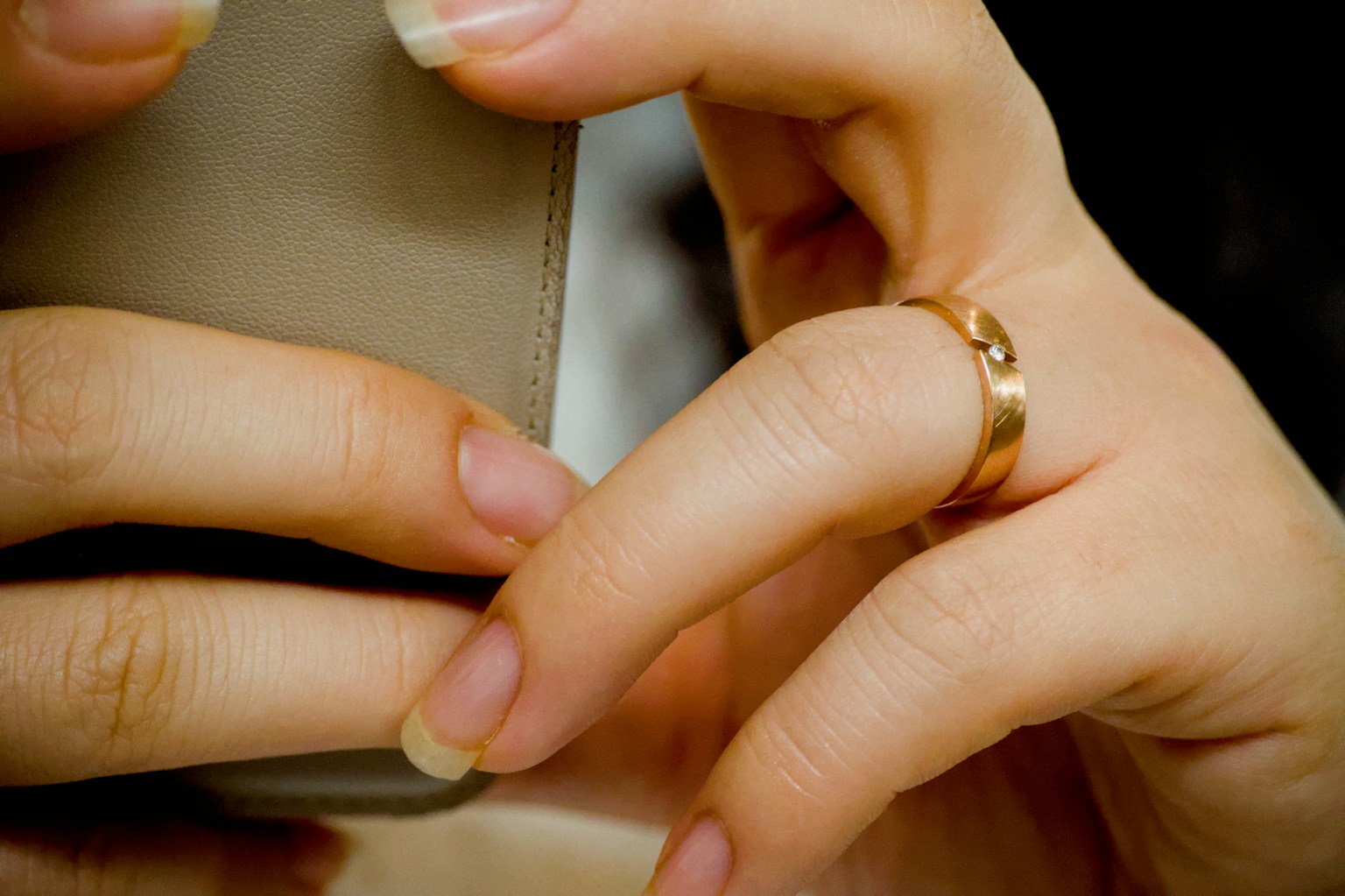 Close view of hands holding a smartphone